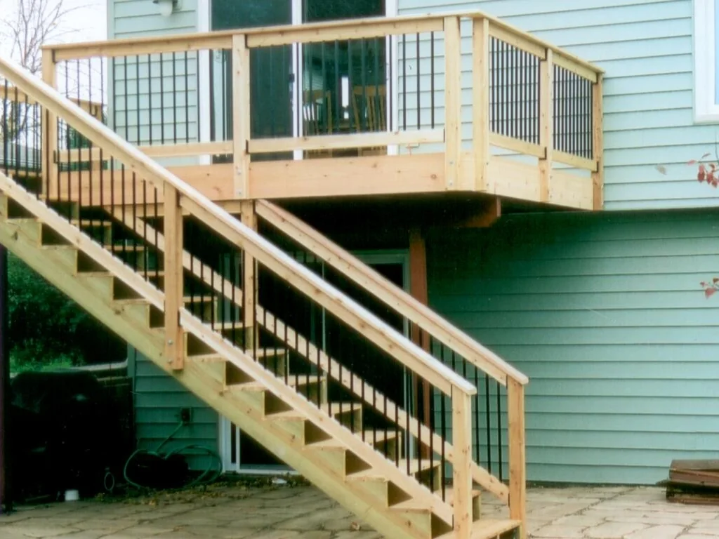 Small raised deck with black balusters