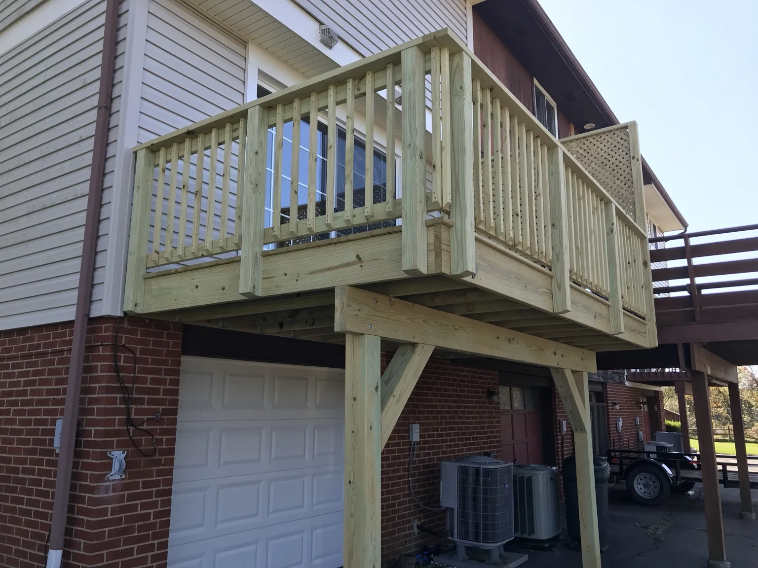 Small raised deck over garage